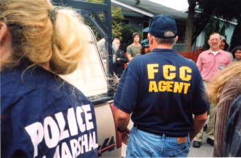 An FCC agent shows up at Hunter Thompson’s jammerpalooza. A very young Jason Torchinsky in the olive shirt in the background, and yes, that’s Mike Valentine grinning on the right.